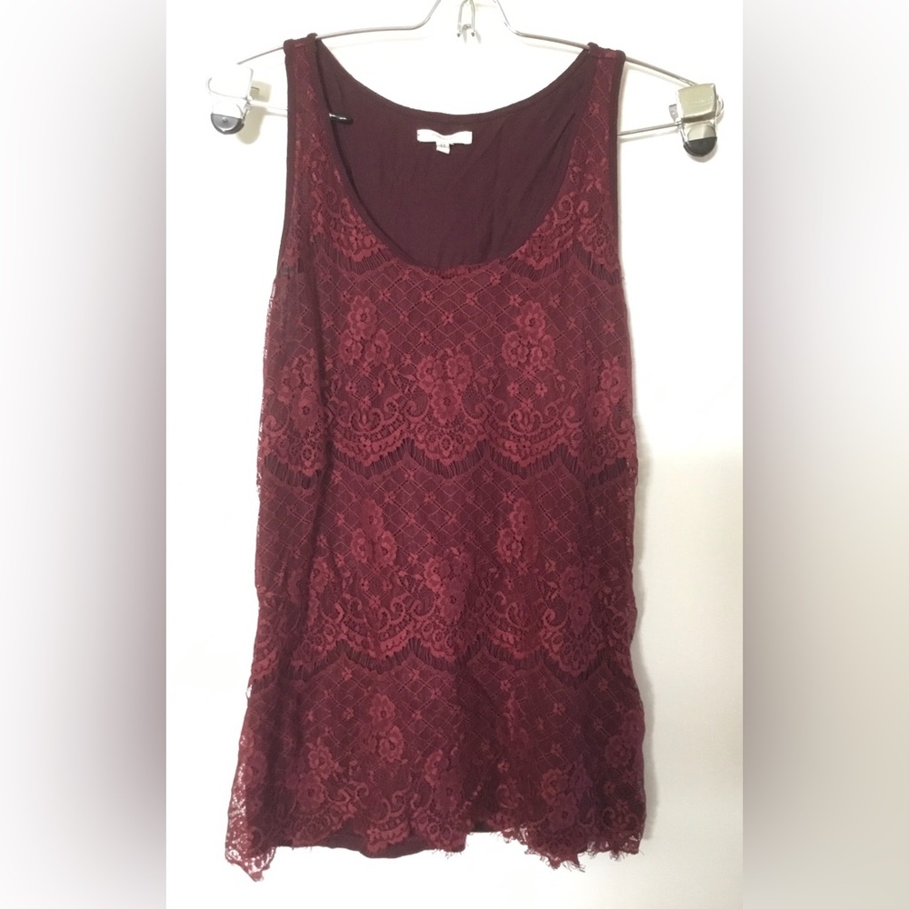 Maurice’s lacy sleeveless top.